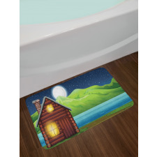 Cabin near River at Night Bath Mat