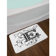 Capitaized Sign Swirls Bath Mat