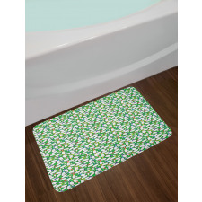 Colorful Pins on Green Bath Mat