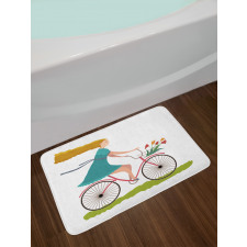 Woman on Bike Tulips Bath Mat