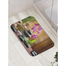 Warm Stones and Flowers Bath Mat