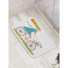 Woman on Bike Tulips Bath Mat