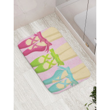 Colored Pointe Shoes on Pink Bath Mat