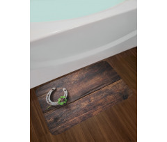 Rusty Horseshoe on Wooden Bath Mat