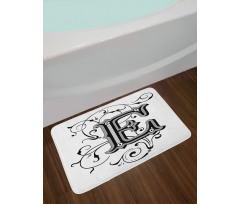 Capitaized Sign Swirls Bath Mat