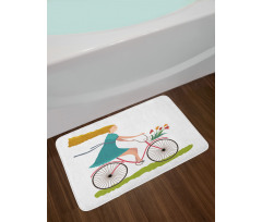 Woman on Bike Tulips Bath Mat