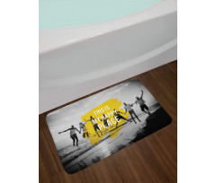 Jumping People on Beach Blur Bath Mat