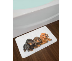 Puppies Lying Together Bath Mat