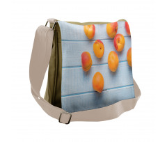 Apricots on Blue Wooden Table Messenger Bag