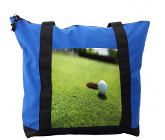 Golf Ball on Lip of Cup Grass Shoulder Bag