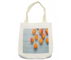 Apricots on Blue Wooden Table Tote Bag