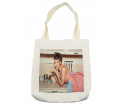 Girl Eating a Cake Tote Bag