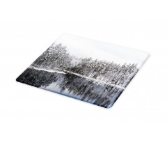 Trees in Cold Day Lake Cutting Board