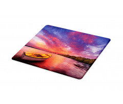 Sea Coast with a Rowboat Cutting Board