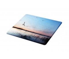 Geese Flying Across Wild Lake Cutting Board