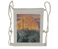 Photo of Sunset over Rock Drawstring Backpack