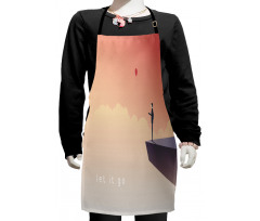 Man Standing on a Cliff Kids Apron