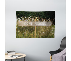 Sign Pole Among Field Wide Tapestry