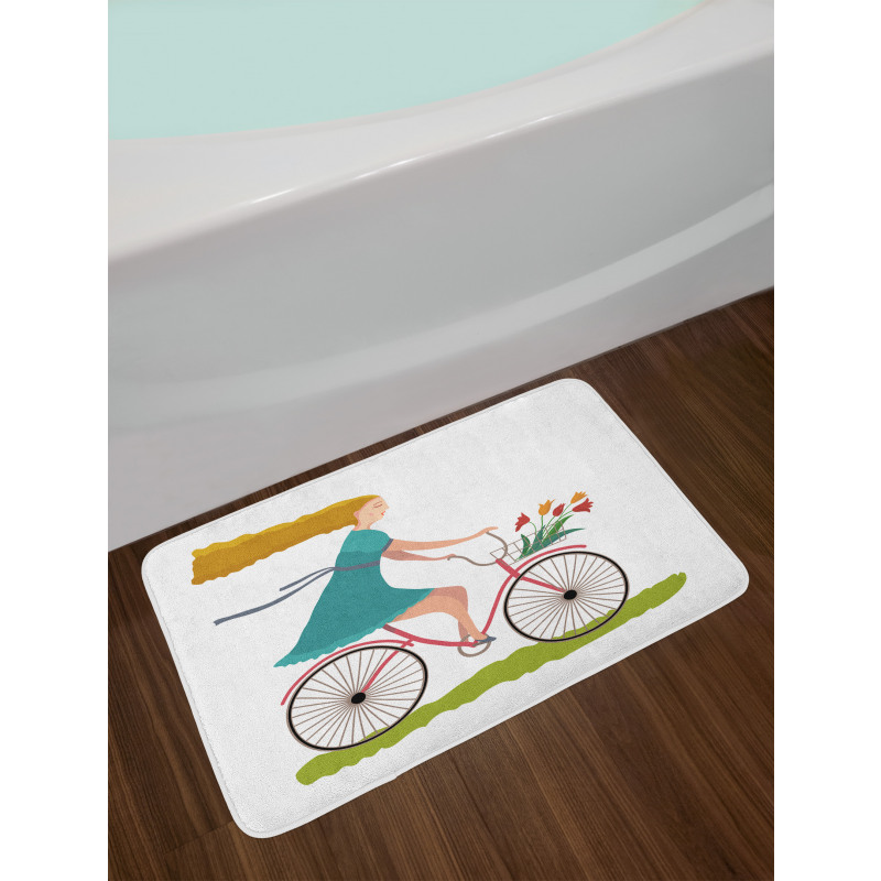 Woman on Bike Tulips Bath Mat