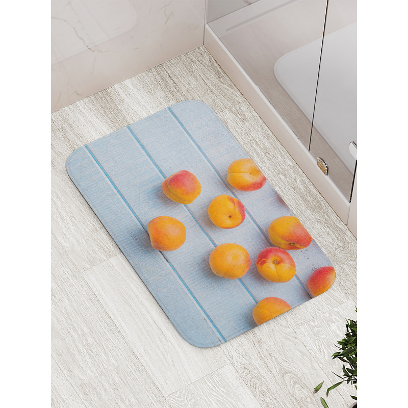 Apricots on Blue Wooden Table Bath Mat