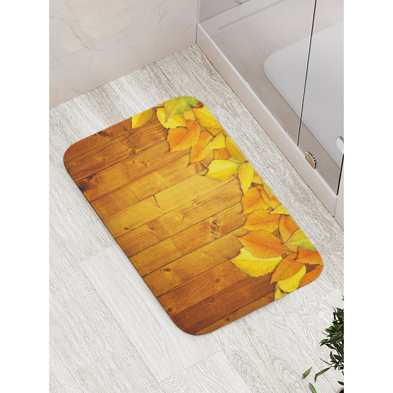 Leaves on Wooden Planks Bath Mat