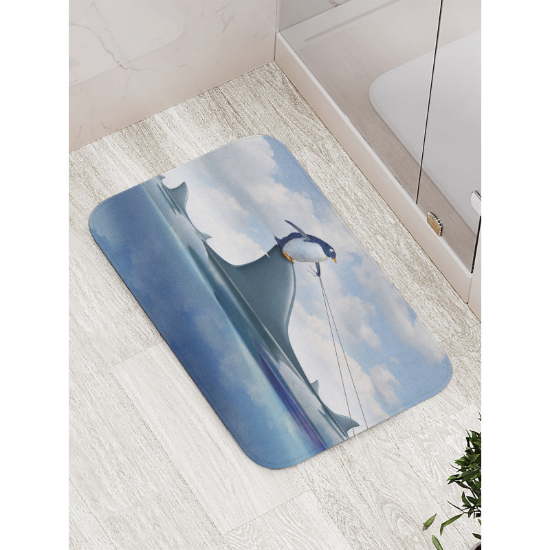 Penguin Holding Wild Fish Bath Mat