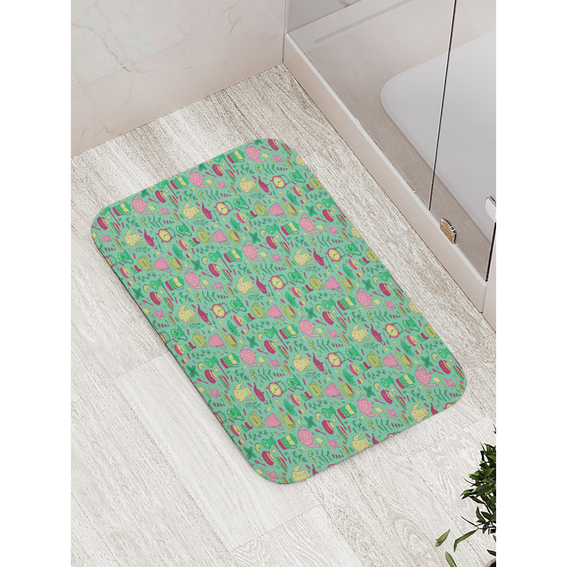 Teapots and Cups on Green Bath Mat