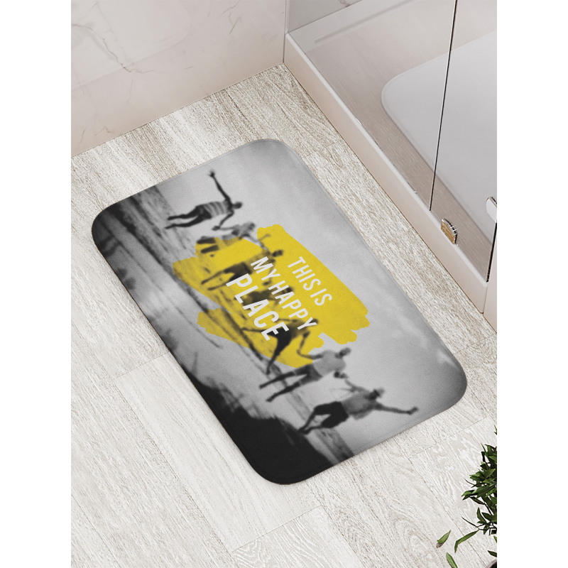 Jumping People on Beach Blur Bath Mat