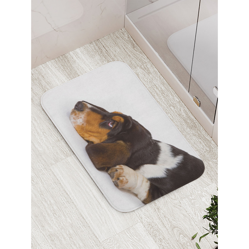 Innocently Lying Dog Bath Mat