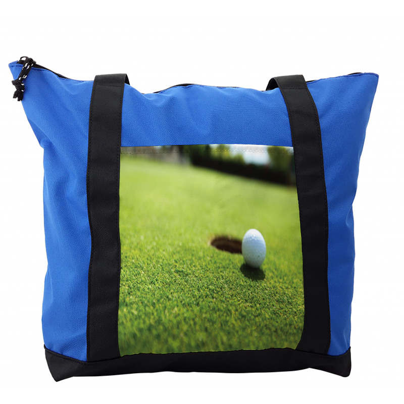 Golf Ball on Lip of Cup Grass Shoulder Bag