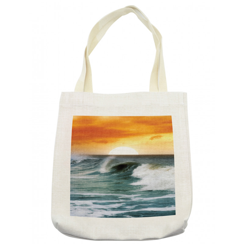 Sunset over Wavy Ocean Tote Bag