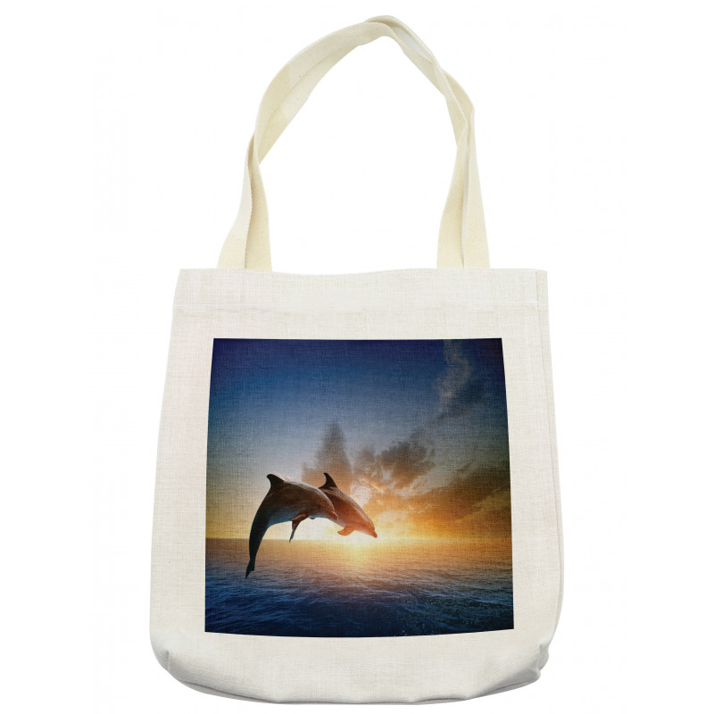 Couple of Dolphins Jump on Sea Tote Bag