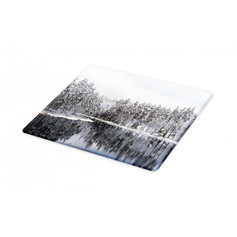 Trees in Cold Day Lake Cutting Board