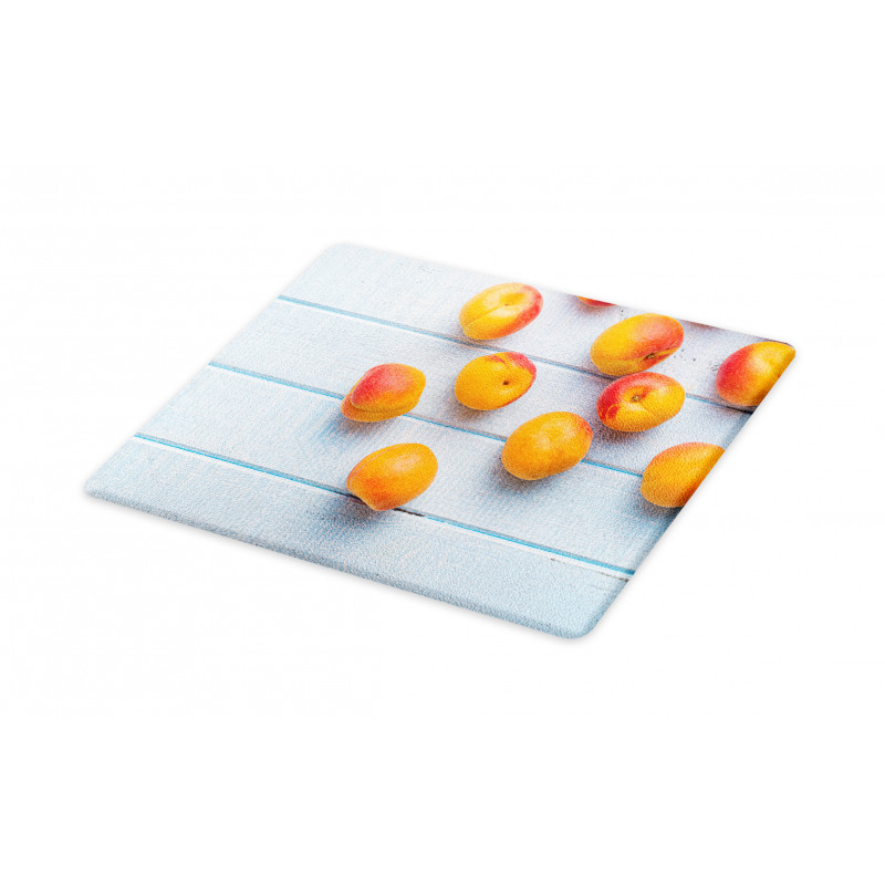 Apricots on Blue Wooden Table Cutting Board