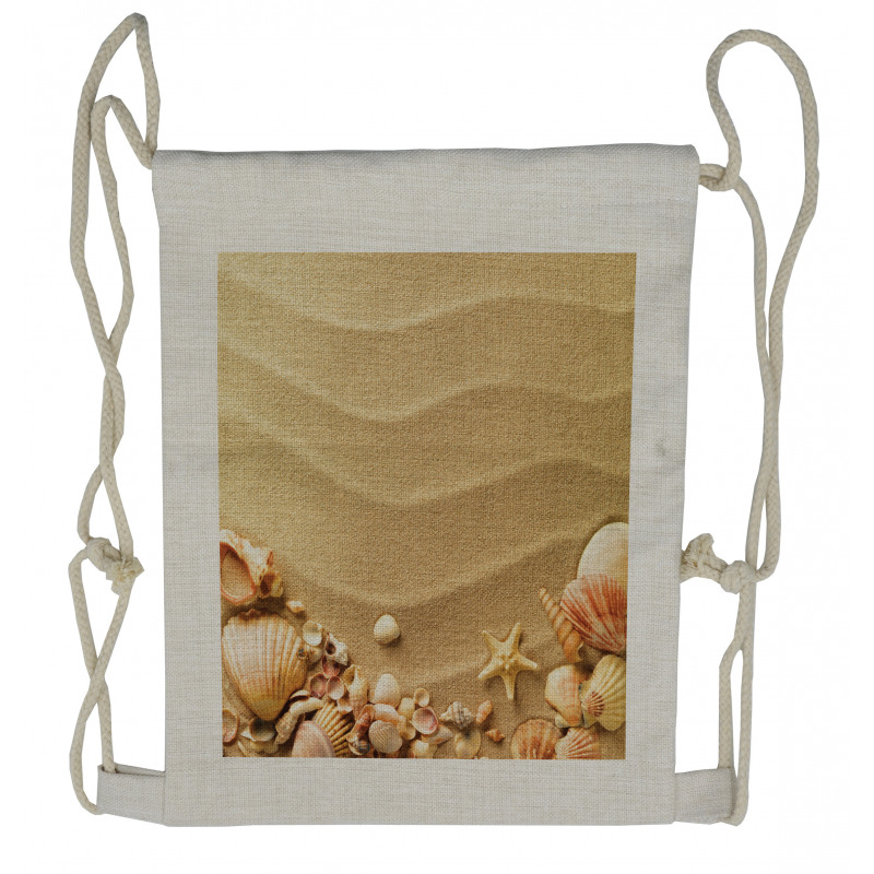 Various Seashells on Sand Drawstring Backpack