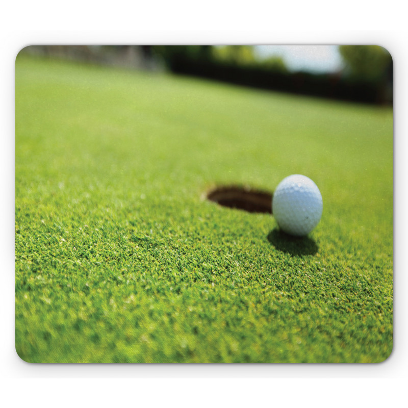 Golf Ball on Lip of Cup Grass Mouse Pad