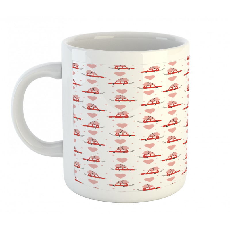 Car Carrying a Heart on Top Mug