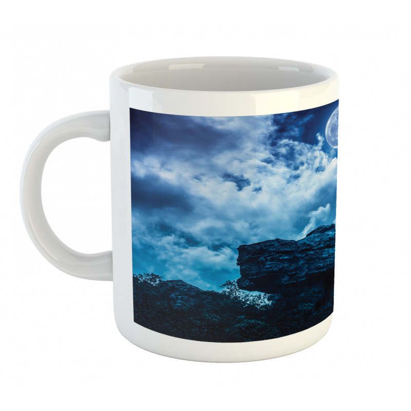 Cliff Under Cloudy Night Mug