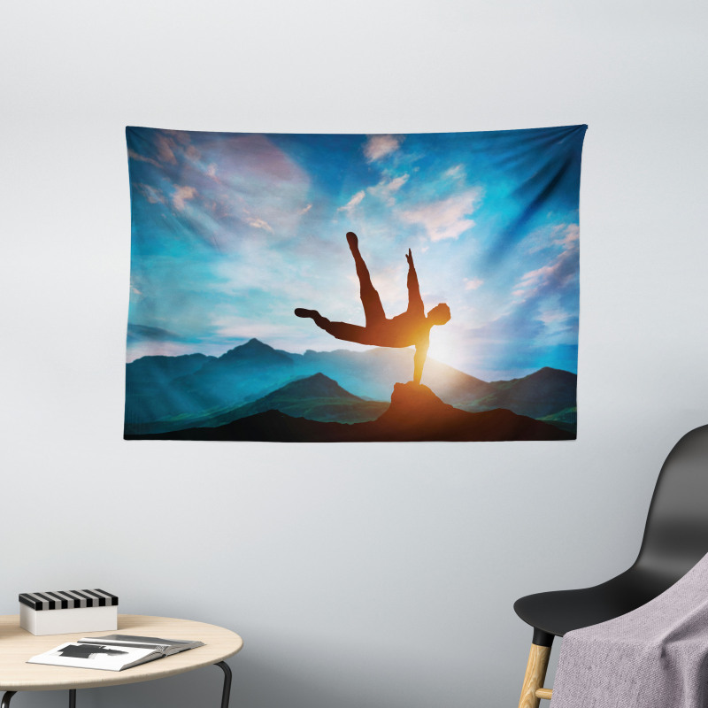 Man Jumping over Rocks Wide Tapestry